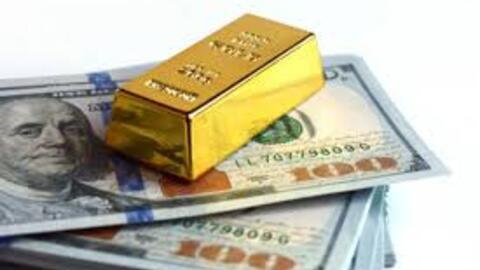 Vàng thế giới nhích nhẹ khi đồng USD suy yếu