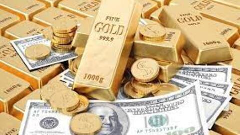 Vàng thế giới tăng nhẹ khi đồng USD giảm