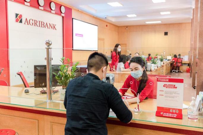 Nhiều ngân hàng miễn 100% phí dịch vụ thanh toán - Ảnh 1. Nhiều ngân hàng miễn 100% phí dịch vụ thanh toán - Ảnh 1.