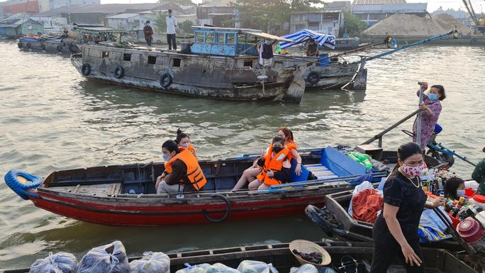 Cần Thơ, Vĩnh Long: Khách du lịch tăng trong những ngày Tết - Ảnh 3.