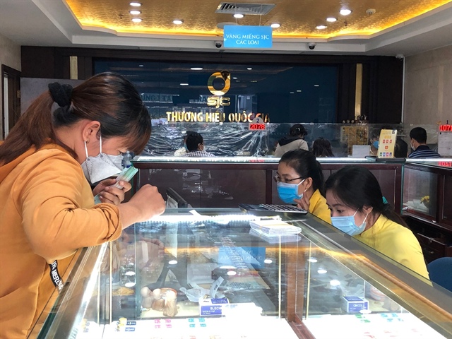 Giá vàng hôm nay 27.9.2022: SJC cao hơn quốc tế gần 20 triệu đồng/lượng - ảnh 1