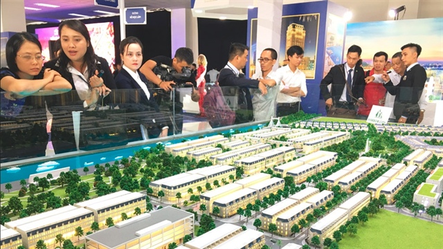 Bắt đầu mùa 'săn' bất động sản bán lỗ - ảnh 1