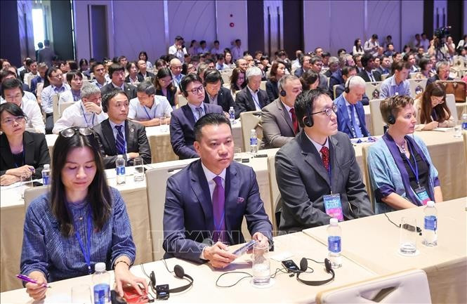 Các đại biểu tham dự Hội nghị quán triệt, triển khai Nghị quyết của Quốc hội về Trung tâm tài chính quốc tế tại Việt Nam. Ảnh: Dương Giang/TTXVN